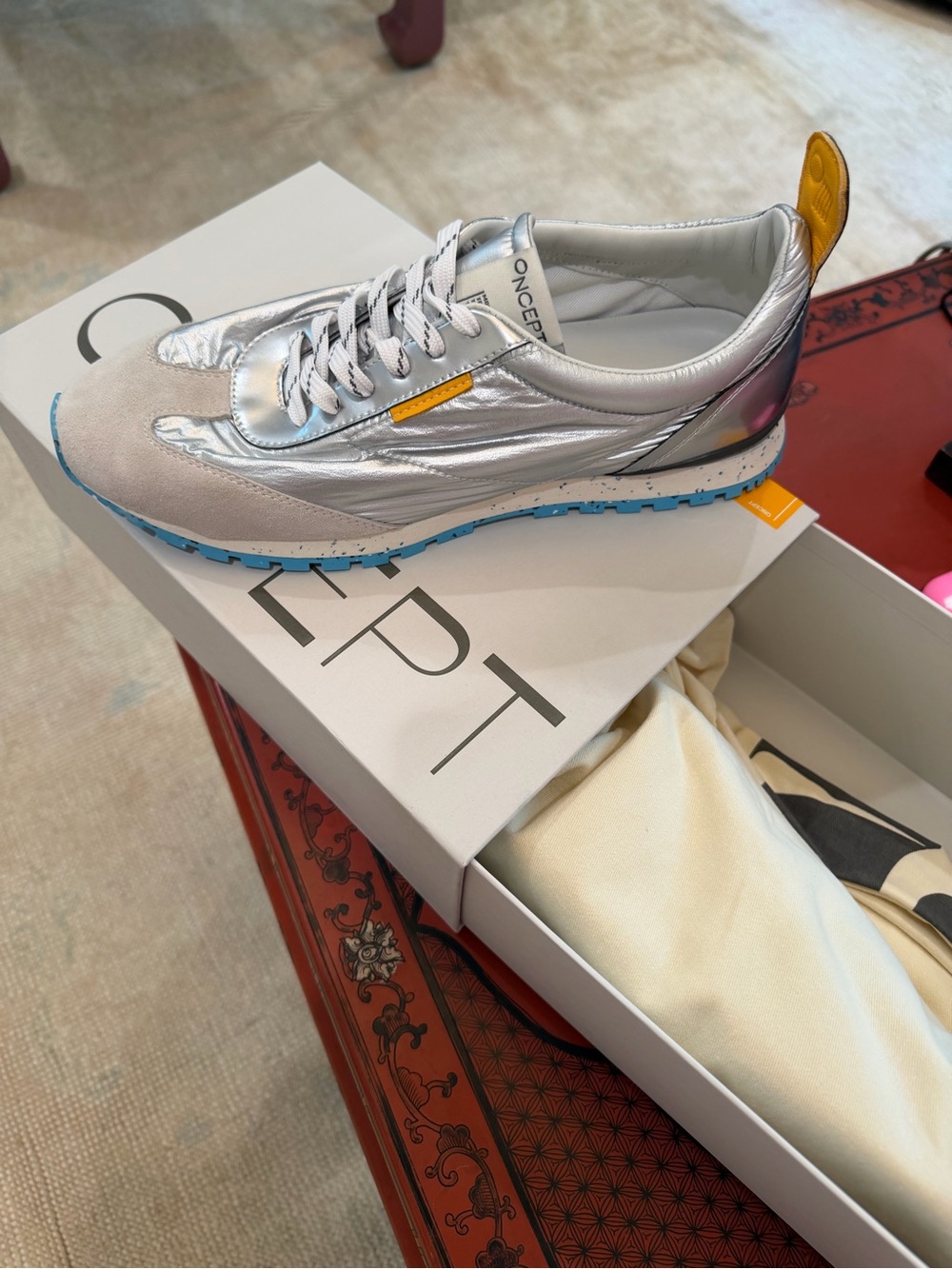 Oncept Tokyo Metallic Silver Low-Top Sneaker with Blue Sole